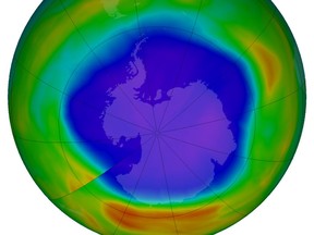 This combination of images made available by NASA shows areas of low ozone above Antarctica on September 2000, left, and September 2018. The purple and blue colors are where there is the least ozone, and the yellows and reds are where there is more ozone. A United Nations report released on Monday, Nov. 5, 2018 says Earths protective ozone layer is finally healing after aerosol sprays and coolants ate away at it. (NASA via AP) ORG XMIT: NY459