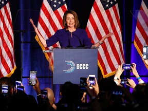 Nancy Pelosi smiles as she is cheered by a crowd of Democratic supporters during an election night returns event at the Hyatt Regency Hotel, on Tuesday, Nov. 6, 2018, in Washington. ( Photo/)