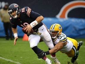 Chicago Bears quarterback Mitchell Trubisky is sacked by  Nick Perry of the Green Bay Packers in the third quarter at Soldier Field on Nov. 12, 2017, in Chicago.