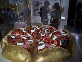 This Nov. 2, 2018 photo shows a textile sculpture from artist Hein Koh called "Mystic Pizza," part of a group art exhibition celebrating pizza at The Museum of Pizza in New York.
