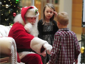Gemma Lorenz and her autistic brother Mason meet Santa at Langley's Willowbrook Shopping Centre which is one of four malls in B.C. offering a "sensory-friendly" Santa experience for kids with autism spectrum disorder.