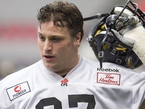 Hamilton Tiger-Cats offensive linesman Peter Dyakowski (67) is seen during practice with the CFL football team at B.C. Place in Vancouver, B.C., on Thursday, Nov. 27, 2014.