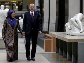 President of Turkey Recep Tayyip Erdogan and his wife Emine Erdogan arrive at the official dinner on the eve of the international ceremony for the Centenary of the WWI Armistice of 11 November 1918 at the Orsay Museum, in Paris, France, Saturday, Nov. 10, 2018.