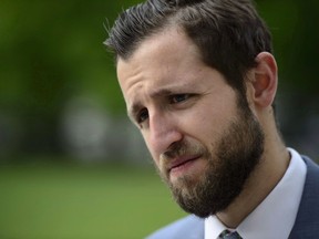 Journalist Ben Makuch of Vice Media arrives to the Supreme Court of Canada in Ottawa on May 23, 2018. The Supreme Court of Canada says a reporter must give the RCMP material he gathered for stories about an accused terrorist.