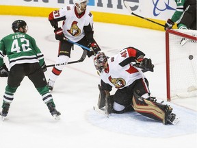 The Dallas Stars' Taylor Fedun (42) scores a goal as Ottawa Senators defenceman Ben Harpur (67) and goaltender Craig Anderson (41) defend during the second period of an NHL hockey game on Friday, Nov. 23, 2018, in Dallas.