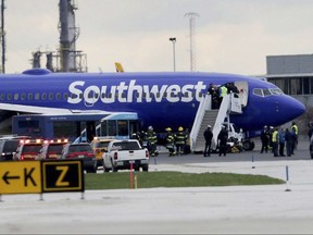 A Southwest Airlines plane sits on the runway at the Philadelphia International Airport on April 17, 2018.