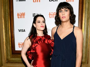 Emily Hampshire, left, and Teddy Geiger attend the "The Death And Life Of John F. Donovan" premiere during 2018 Toronto International Film Festival at Winter Garden Theatre on Sept. 10, 2018 in Toronto. (Emma McIntyre/Getty Images)