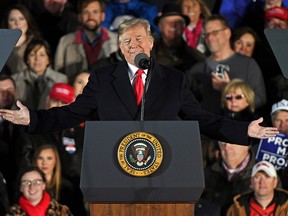 U.S. President Donald Trump speaks during a rally in Tupelo, Miss., Monday, Nov. 26, 2018.