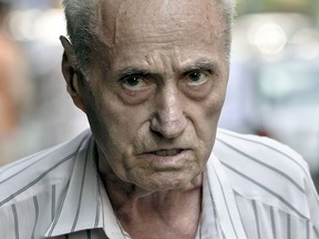This Tuesday July 30, 2013 file photo shows retired Lt. Col. Alexandru Visinescu, 87, former commander of the Ramnicu Sarat prison from 1956 to 1963. (AP Photo/Vadim Ghirda, File)