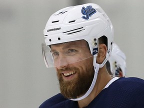 Winnipeg Jets captain Blake Wheeler smiles during a skate at the Iceplex.