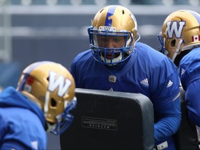 Jackson Jeffcoat takes part in a blocking drill during Winnipeg Blue Bombers practice on Wed., Nov. 14, 2018. Kevin King/Winnipeg Sun/Postmedia Network