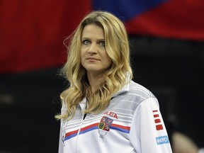 Tennis player Lucie Safarova of the Czech Republic watches a tennis match of the Fed Cup Final between Czech Republic and United States in Prague, Czech Republic, Saturday, Nov. 10, 2018. Former French Open finalist Lucie Safarova said on Saturday that she is planning to retire after the Australian Open.
