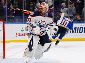 Cam Talbot of the Edmonton Oilers celebrates after beating the St. Louis Blues in a shootout at the Enterprise Center on Dec. 5, 2018 in St. Louis, Mo.
