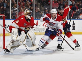 Panthers defenceman Aaron Ekblad battles Canadiens' Max Domi in front of goalie Roberto Luongo during second period in Sunrise, Fla., Friday night, Dec. 28, 2018.