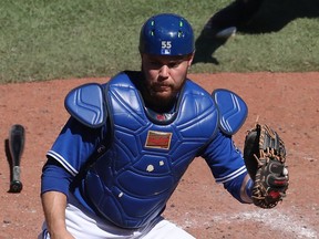 Jays catcher Russell Martin waits for the throw at the Rogers Centre on July 8, 2018 in Toronto, Canada. (Photo by Tom Szczerbowski/Getty Images)