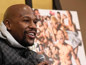 US boxing superstar Floyd Mayweather Jr speaks to the media during a press conference at a Tokyo hotel on December 29, 2018.