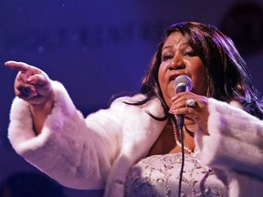 Aretha Franklin performs outside Holt Renfrew as part of the store's unveiling of their holiday theme's windows Nov. 6, 2007.