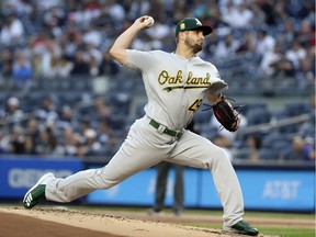 In this May 11, 2018, file photo, Oakland Athletics' Kendall Graveman delivers a pitch during the first inning of the team's baseball game against the New York Yankees in New York.