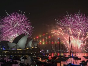 Fireworks explode over the Sydney Harbour during New Year's Eve celebrations in Sydney, Monday, Dec. 31, 2018.