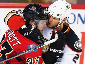 Calgary Flames Sam Bennett battles with Kevin Bieksa of the Anaheim Ducks during the Stanley Cup playoffs in Calgary on Monday, April 17, 2017. (AL CHAREST/POSTMEDIA)