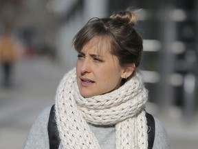 Television actress Allison Mack leaves federal court in New York, Thursday, Dec. 6, 2018.