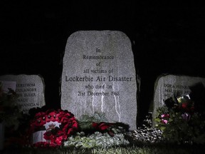 A memorial stone in memory of the victims of the bombing of Pan Am flight 103, is displayed in the garden of remembrance near Lockerbie, Scotland Friday Dec. 21, 2018.