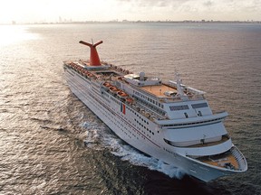 The 855-foot long Carnival Fantasy cruises off the Florida coast in this undated file photo. (Andy Newman/Carnival Cruise Lines)