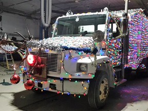 A garbage truck decorated with Christmas decorations is shown in this undated handout photo.