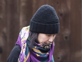 Huawei chief financial officer Meng Wanzhou leaves her home in Vancouver on Dec. 12, 2018.