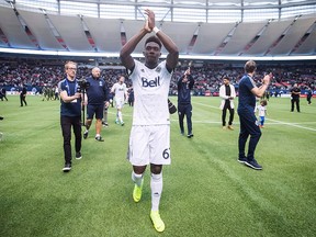 Vancouver Whitecaps midfielder Alphonso Davies salutes the crowd after playing his final match as a member of the MLS soccer team, in Vancouver, on October 28, 2018. (THE CANADIAN PRESS/Darryl Dyck)