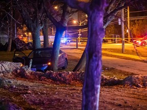Toronto police are investigating after a man was found shot to death inside a car that crashed into a tree along Islington Ave. near Dixon Rd. on Wednesday evening. (Victor Biro photo)