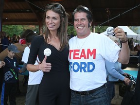 Toronto mayor candidate Faith Goldy poses with Daniel Boone at Ford Fest BBQ on Saturday September 22, 2018. (Jack Boland/Toronto Sun)