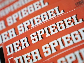 The Dec. 19, 2018 photo shows issues of German news magazine Spiegel arranged on a table in Berlin. (Kay Nietfeld/dpa via AP)