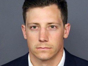 This undated file photo provided by the Denver Police Department shows Chase Bishop, an off-duty FBI agent agent who accidentally shot a man in the leg after doing a backflip while dancing at a Denver bar. (Denver Police Department via AP)