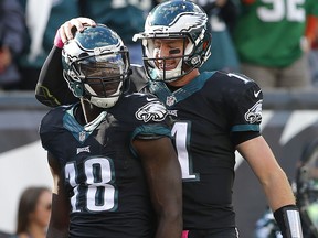 Dorial Green-Beckham of the Philadelphia Eagles is congratulated by Carson Wentz after scoring a touchdown at Lincoln Financial Field on October 23, 2016 in Philadelphia. (Rich Schultz/Getty Images)