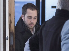 Christopher Calvin Garnier, charged with second-degree murder in the death of Truro police officer Const. Catherine Campbell, heads from Nova Supreme Court during a break in Halifax on Wednesday, Dec. 20, 2017.