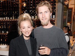 Kaley Cuoco, left, and Karl Cook attend the EBMRF hosts "Sip. Savor. Support." at Wally's Beverly Hills on November 12, 2018 in Beverly Hills, Calif.  (Ella DeGea/Getty Images)