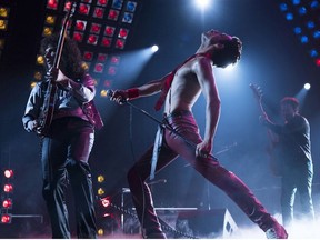 This image released by Twentieth Century Fox shows Gwilym Lee, from left, Rami Malek and Joe Mazzello in a scene from "Bohemian Rhapsody."