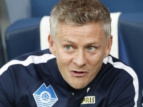 FILE - In this Thursday, Aug. 23, 2018 file photo, Molde's head coach Ole Gunnar Solskjaer watches his team prior to the Europa League play-off round, first leg soccer match between Zenit and Molde at Petrovsky stadium in St. Petersburg, Russia. Manchester United announced Wednesday Dec. 19, 2018, they have hired Ole Gunnar Solskjaer as its manager until the end of the season, bringing the Norwegian back to the club 20 seasons after he scored its winning goal in the Champions League final.