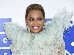 FILE - In this Aug. 28, 2016 file photo, Beyonce Knowles arrives at the MTV Video Music Awards at Madison Square Garden, in New York. There's no more juice in Beyonce's lemonade jar: The singer did not release new music though two albums featuring old Beyonce songs hit streaming services Thursday, Dec. 20, 2018.