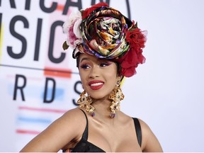 In this Oct. 9, 2018, file photo, Cardi B arrives at the American Music Awards, at the Microsoft Theater in Los Angeles.