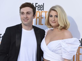 In an April 17, 2018 file photo, Meghan Trainor, right, and Daryl Sabara arrive at the world premiere of "I Feel Pretty" at the Westwood Village Theater in Los Angeles.
