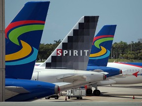 Spirit Airlines Inc. planes sit on the tarmac at the Fort Lauderdale International Airport on June 14, 2010 in Fort Lauderdale, Florida. (Joe Raedle/Getty Images)