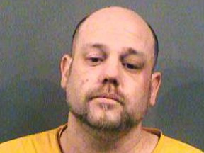 This file photo provided by the Sedgwick County Sheriff's Office in Wichita, Kan., shows Stephen Bodine, one of two people being held in the death of 3-year-old Evan C. Brewer, discovered encased in concrete Sept. 2, 2017, inside a Wichita house where Bodine and his girlfriend, Miranda Miller once lived. (Sedgwick County Sheriff's Office via AP, File)
