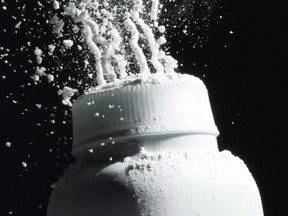 Baby powder is squeezed from its container, in Philadelphia on April 19, 2010.