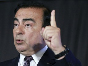 In this May 12, 2016, photo, then-Nissan Motor Co. president and CEO Carlos Ghosn speaks during a joint press conference with Mitsubishi Motors Corp. in Yokohama, near Tokyo. Japanese media say Friday, Dec. 21, 2018, prosecutors press new allegation of breach of trust against Nissan ex-chair Ghosn, who is being detained in the Tokyo Detention Center.