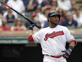 Cleveland Indians' Edwin Encarnacion reacts after striking out against Minnesota Twins starting pitcher Jose Berrios in the fourth inning of a baseball game, Thursday, Aug. 9, 2018, in Cleveland.