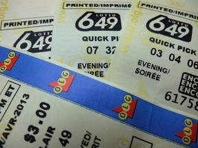 Lotto 649 tickets are shown in Toronto in on December 2, 2013.