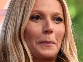Actor Gwyneth Paltrow attends the Hollywood Walk of Fame star unveiling ceremony for producer/director Ryan Murphy (R), December 4, 2018 in Hollywood, California.