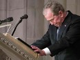 Former President George W. Bush becomes emotional as he speaks at the State Funeral for his father, former President George H.W. Bush, at the National Cathedral, Dec. 5, 2018 in Washington, D.C. (Alex Brandon / POOL / AFP)